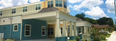 Exterior view of The Manor at Lake Morton facility