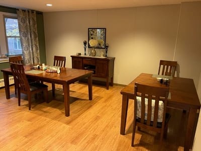 Interior dining area with wooden tables and chairs