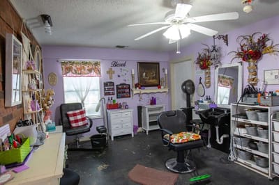 Interior view of a beauty salon with styling chairs