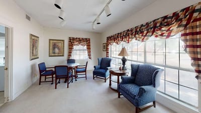 Cozy common area with seating and natural light