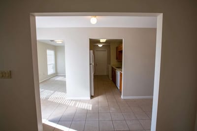 Interior view of an apartment kitchen and living area