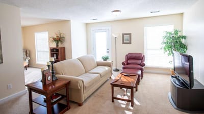 Comfortable common area with seating and natural light
