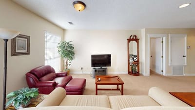 Interior view of a cozy living room with seating