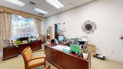 Interior view of an office space with desks and decor