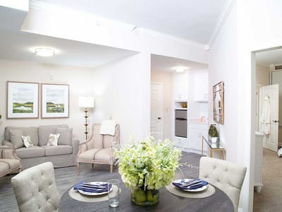 Interior view of a private resident room with furniture