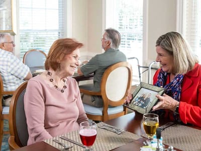 Residents enjoying a meal and sharing memories