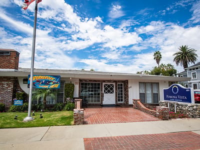 Exterior view of Pomona Vista Care Center with signage