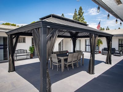 Outdoor seating area with a gazebo and tables
