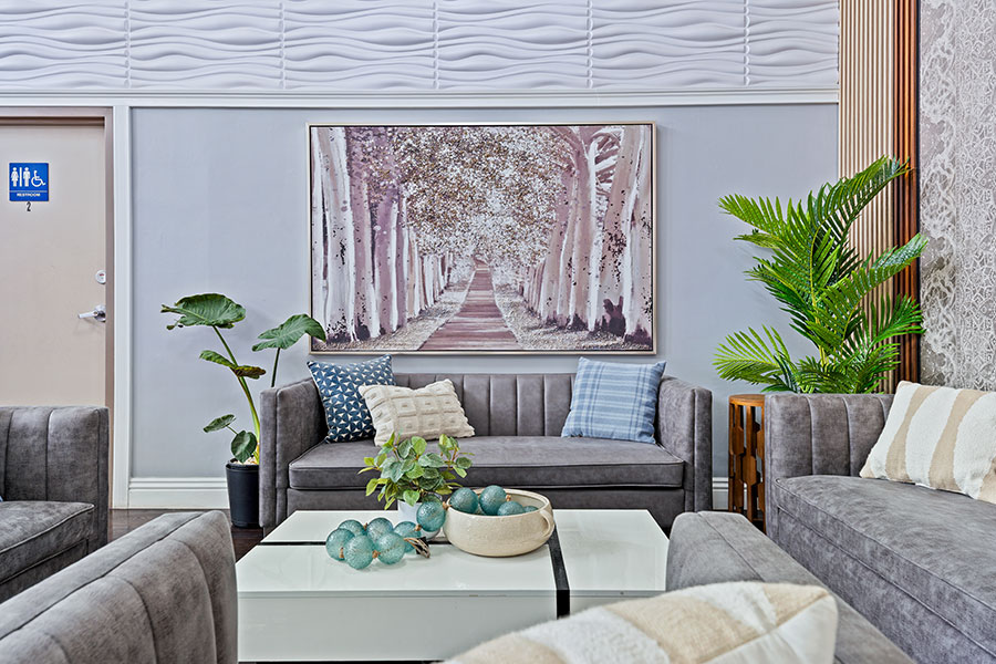 Modern common area with comfortable seating and greenery