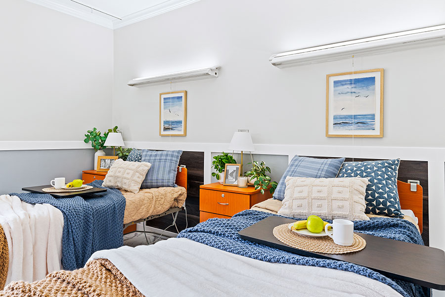 Interior view of a shared resident room with two beds