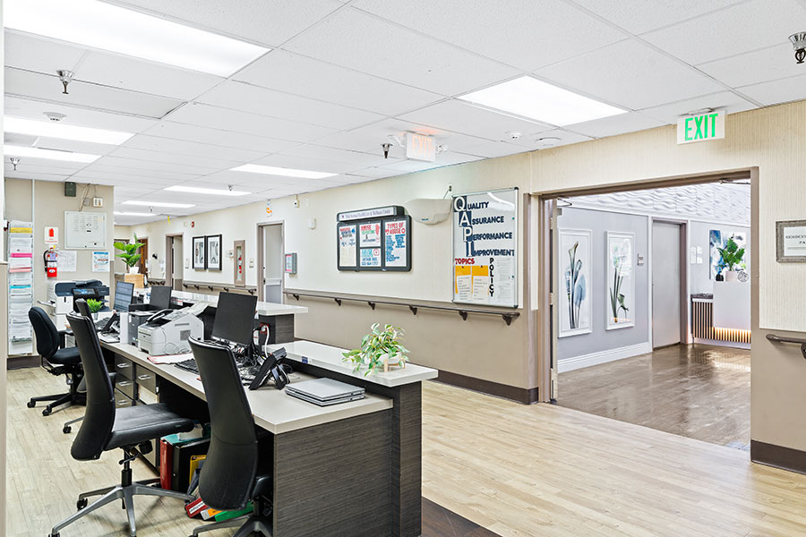 Interior view of a common area with desks and decor