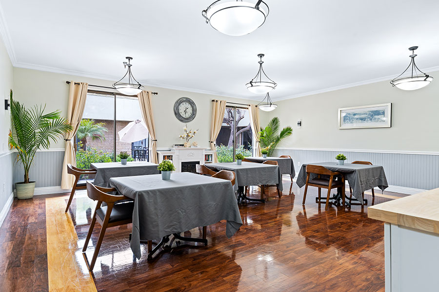 Bright dining area with tables and chairs