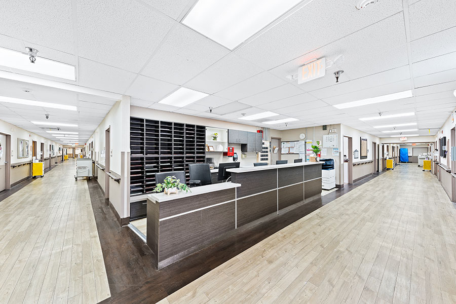 Bright interior hallway of a healthcare facility