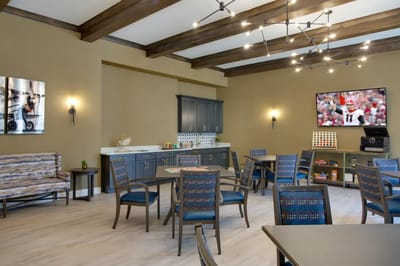 Bright common area with tables and chairs