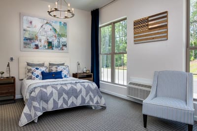 Cozy resident room with a bed and decor