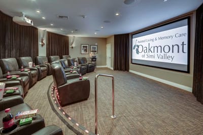 Interior view of a movie theater room for residents