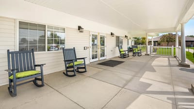 Outdoor seating area with rocking chairs