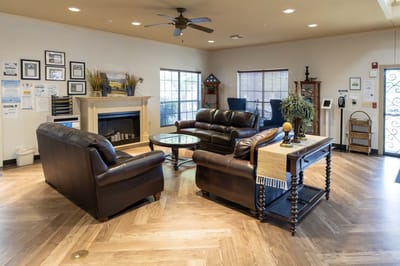 Cozy common area with seating and fireplace