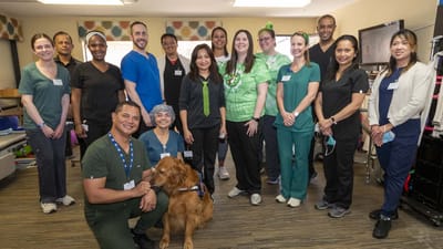 Staff and residents celebrating together in a common area