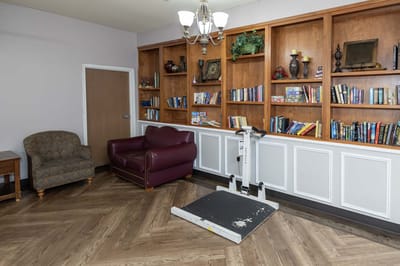Interior common area with bookshelf and seating