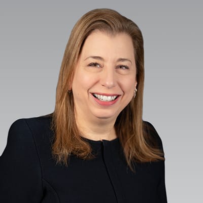 Accent Care – Portland, hospice care in Portland, OR — Smiling woman with long hair in professional attire