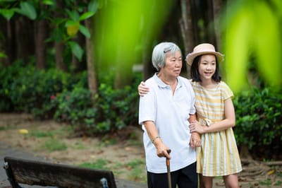Accent Care – Portland, hospice care in Portland, OR — Elderly woman with a younger girl in a garden