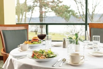 Dining table set with food and drinks