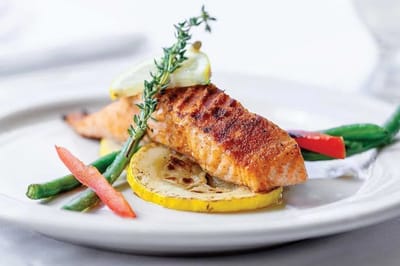 Deliciously plated salmon with vegetables