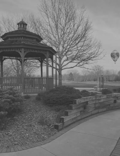 Gazebo in a landscaped outdoor area.