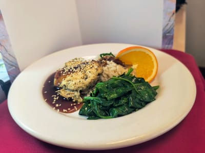 Plated meal with chicken, rice, and spinach
