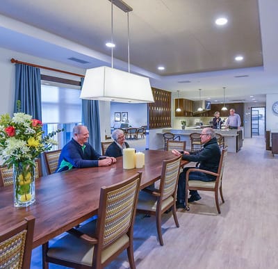 Residents engage socially in a common area.