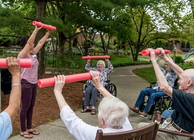 Seniors engaging in outdoor exercise activities