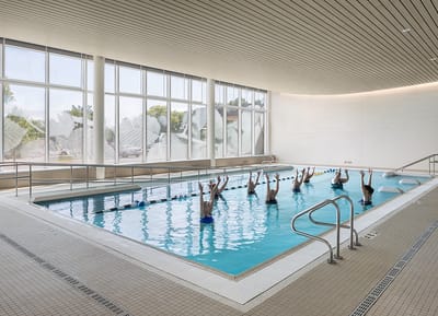 Residents participating in water aerobics class.