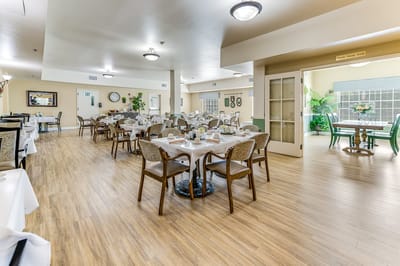 Dining area with tables and chairs set up