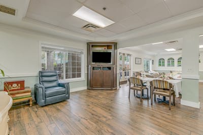 Common area with seating and a TV.
