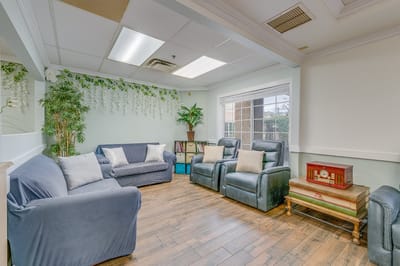 Comfortable common area with seating and plants