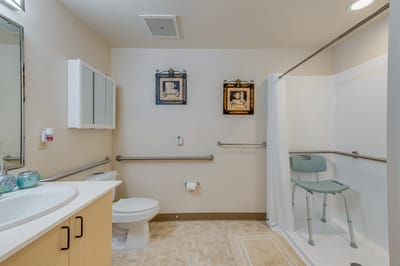 Clean and accessible bathroom with safety features.