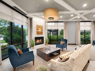 Welcoming common area with seating and fireplace.