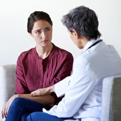 All Ways Caring HomeCare – Missoula, home care in Missoula, MT — Caregiver counseling a young woman in a serene space