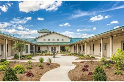 Beautiful courtyard of a senior living facility with landscaping