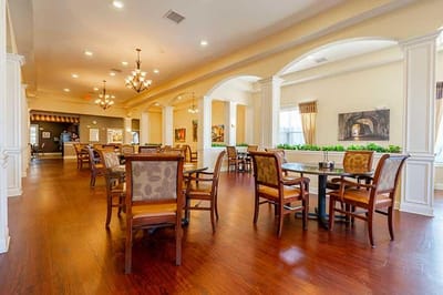 Bright common area with tables and chairs