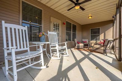 Outdoor seating area with rocking chairs