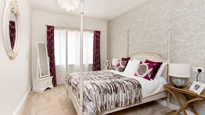 A well-decorated resident bedroom in the facility