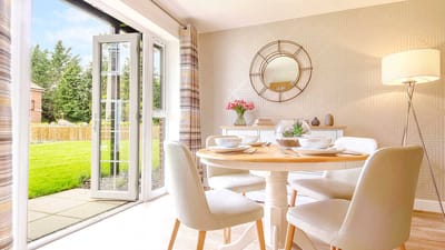 Bright dining area with outdoor view and modern decor