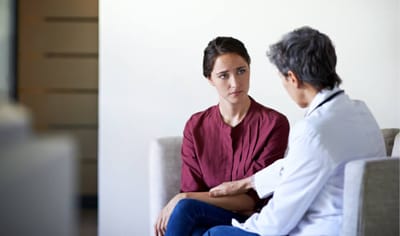 Consultation between two women in a modern interior