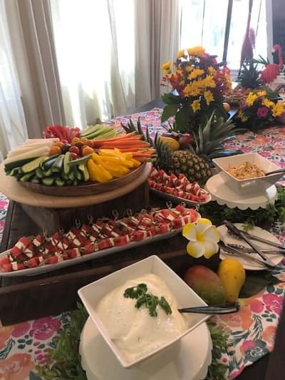 A colorful fruit and vegetable display on a table