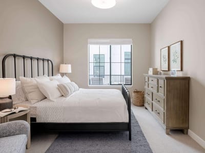 Well-decorated private resident room with natural light