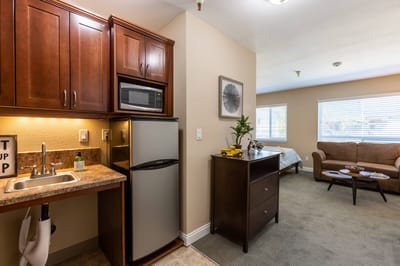 Cozy interior of a resident room with kitchenette