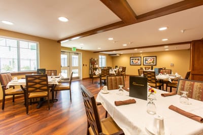 Cozy dining room setup with neatly arranged tables