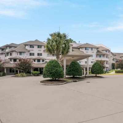 Exterior view of the facility with landscaping